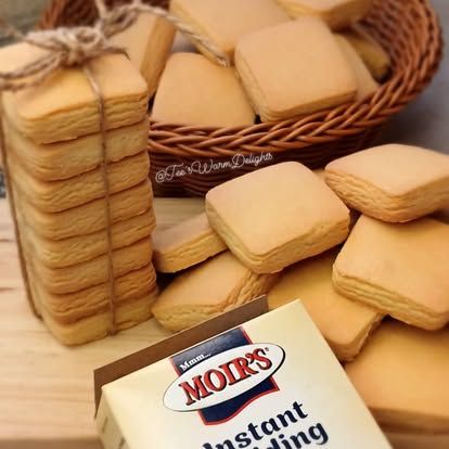 A stack of shortbread biscuits tied with string.